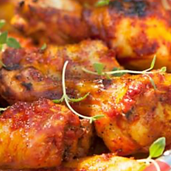 Ailes de poulet sauce tomates